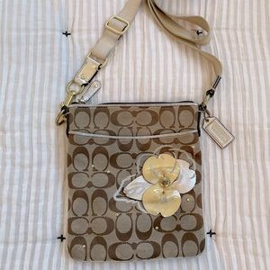 Coach crossbody bag with floral appliqué